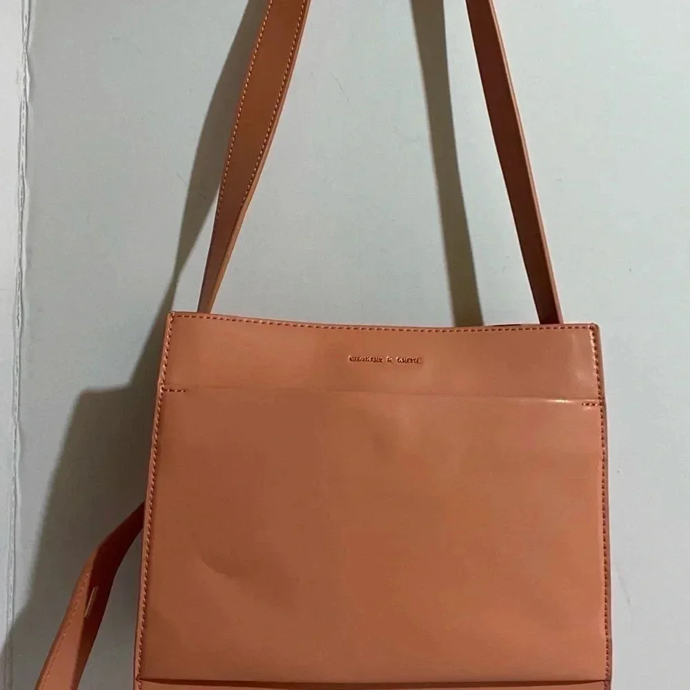 Charles & Keith pink poly crossbody handbag